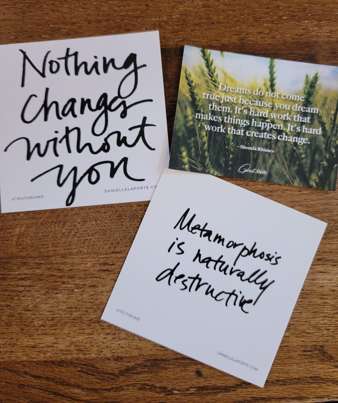 A group of cards on a table

Description automatically generated