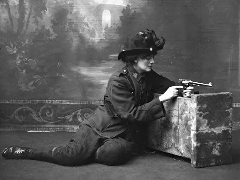 Constance Markievicz poses with a revolver in her Irish Citizens Army uniform, Ireland, c. 1915. A year later she would wear this same uniform in the 1916 Rising. Constance Markievicz poses with a revolver in her Irish Citizens Army uniform, Ireland, c. 1915. A year later she would wear this same uniform in the 1916 Rising.