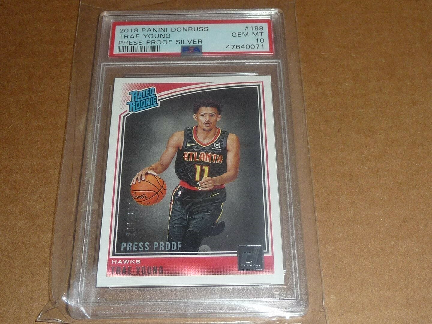 Image 1 - 2018/19 Panini Donruss TRAE YOUNG PRESS PROOF SILVER RC #198 HAWKS /349 PSA 10