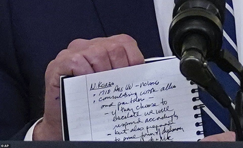 Joe Biden, 78, accidentally reveals cheat sheets and prompts he used to navigate his first press conference (photos)