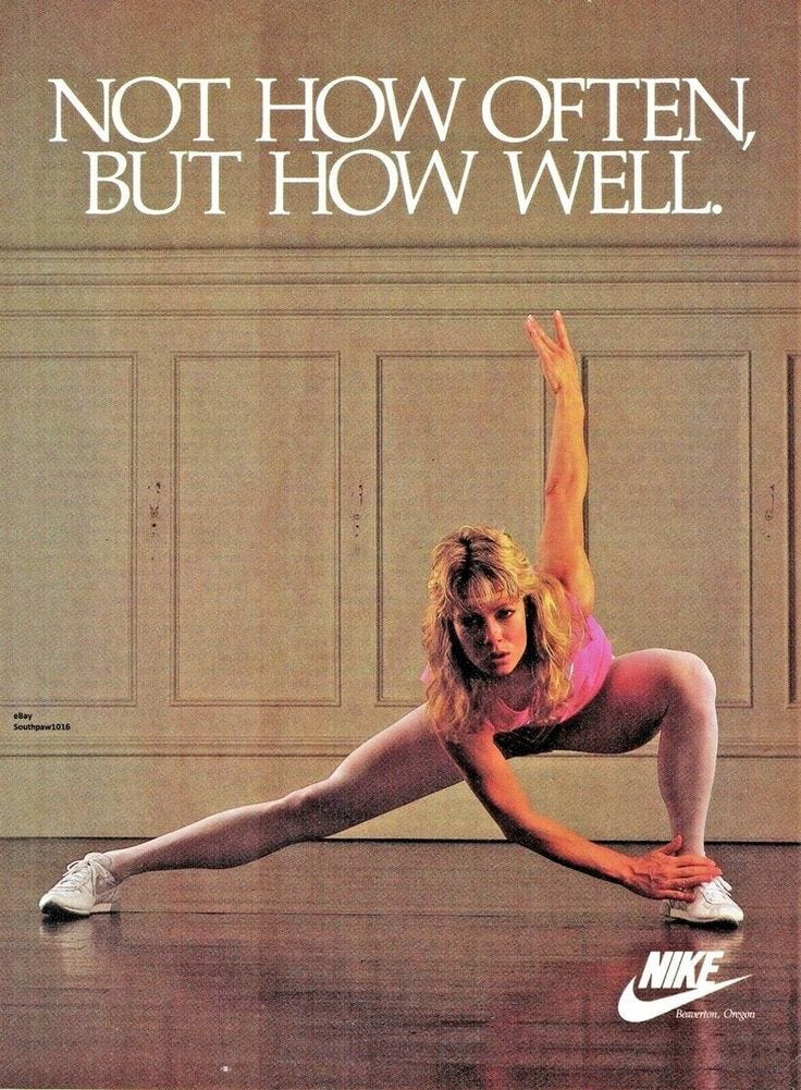 This may contain: an advertisement for nike featuring a young woman doing the splits in front of a wall This may contain: an advertisement for nike featuring a young woman doing the splits in front of a wall