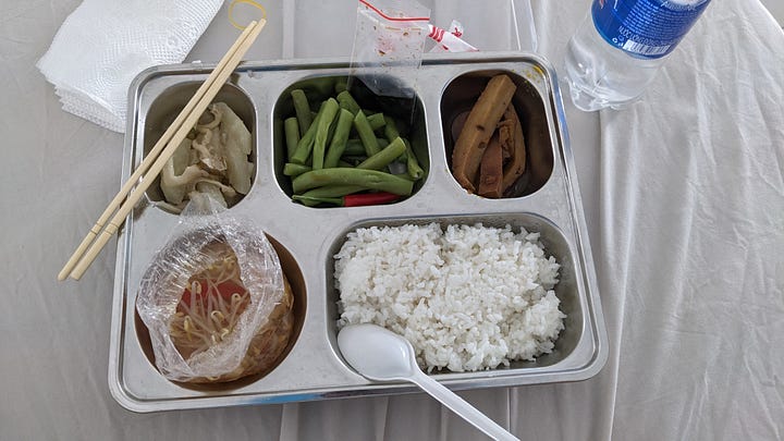 series of vegetarian vietnamese canteen trays