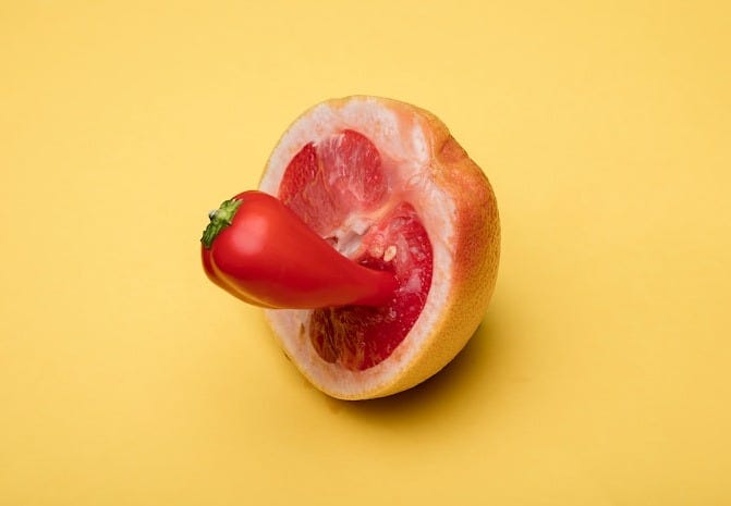 sliced apple fruit on yellow surface