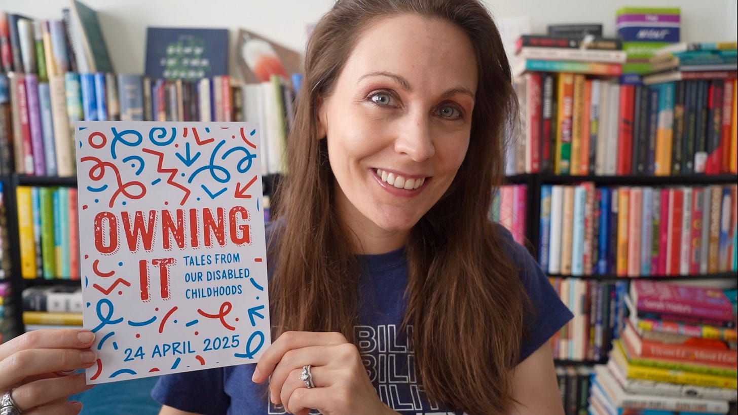 a photo of Kendra holding up a mock up for the cover of Owning It