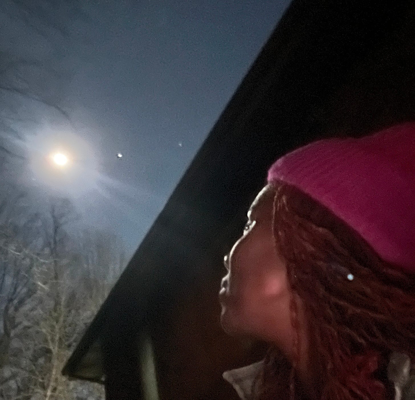 woman looking at the moon