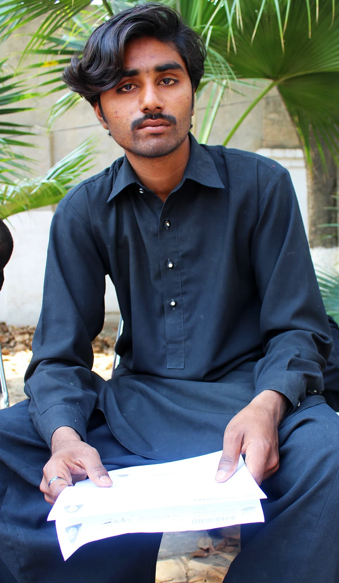 "If I will vote then why shouldn't my wife? Times have changed now" says Qamar Abbas — Photo by author