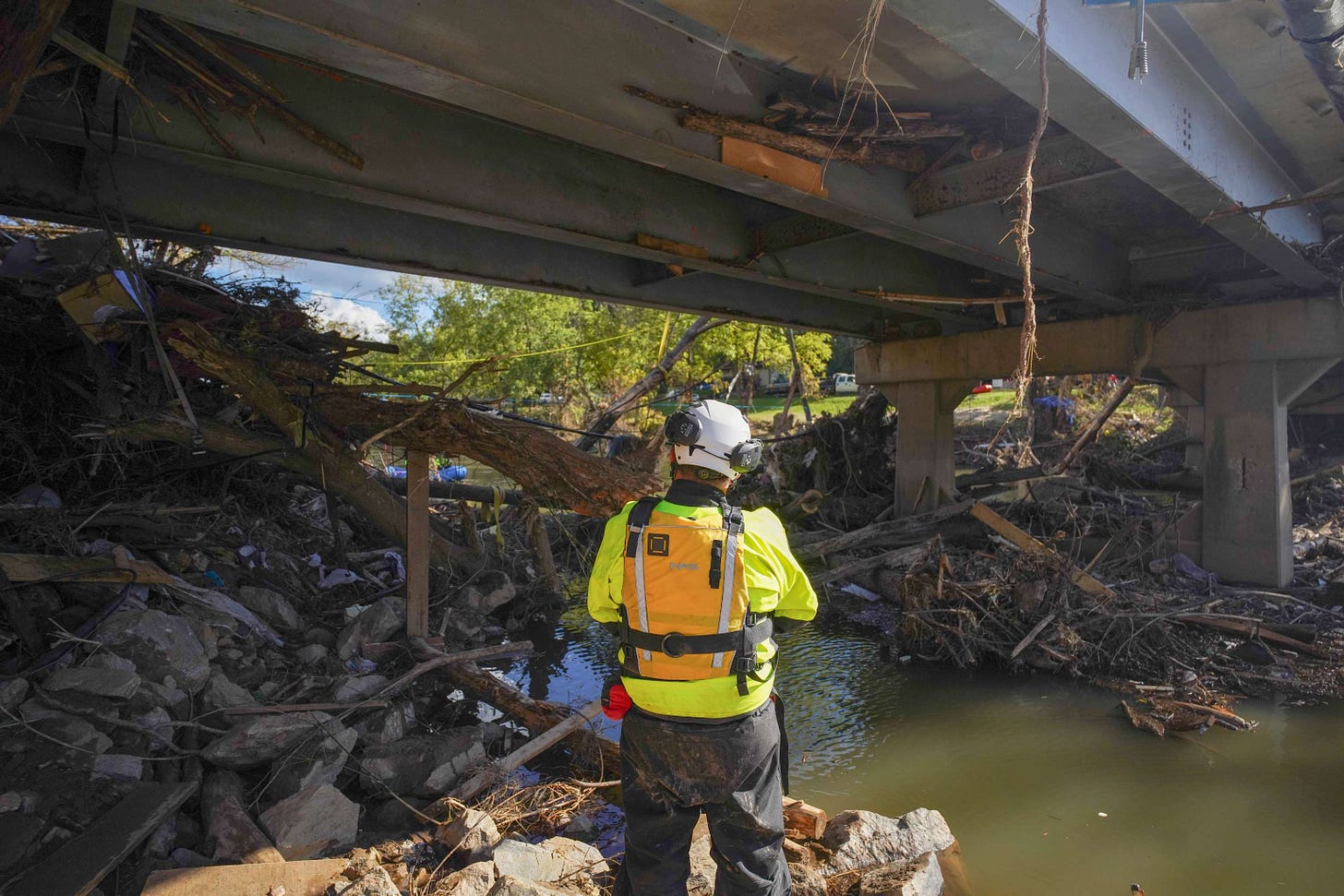 Responders with the Eastern Band of Cherokee are wearing orange vests.