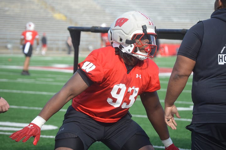 Wisconsin defensive linemen participate in individual position drills during Saturday's spring practice inside Camp Randall Stadium.