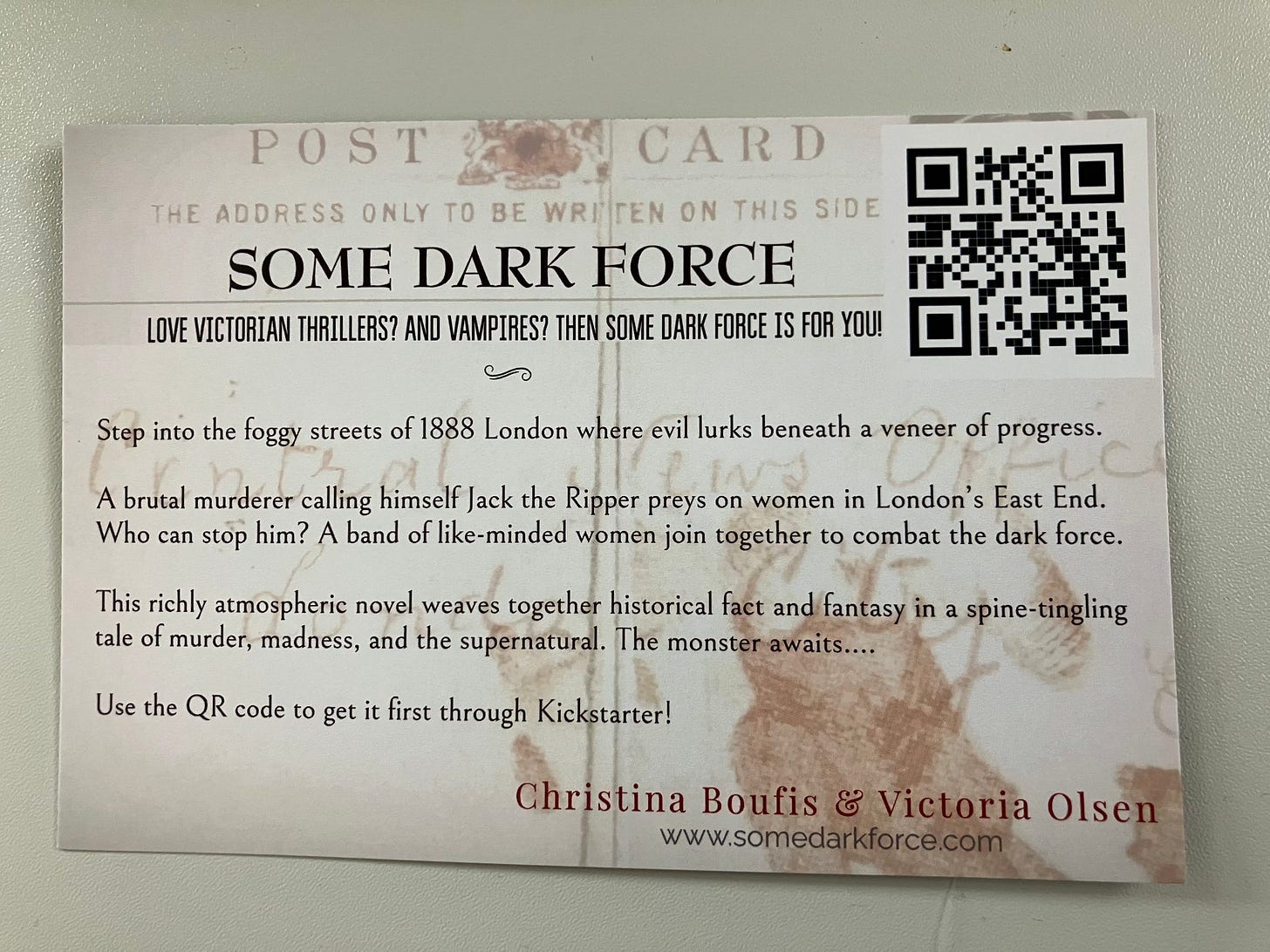reverse of book promo postcard with QR code as stamp