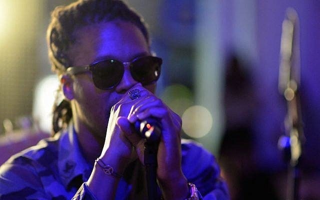 Lupe Fiasco performing at 'Born in Blue: Remixed and Reissued' exhibition opening in Los Angeles, Sept. 10, 2014. (Chris Weeks/Getty Images for Sonos)
