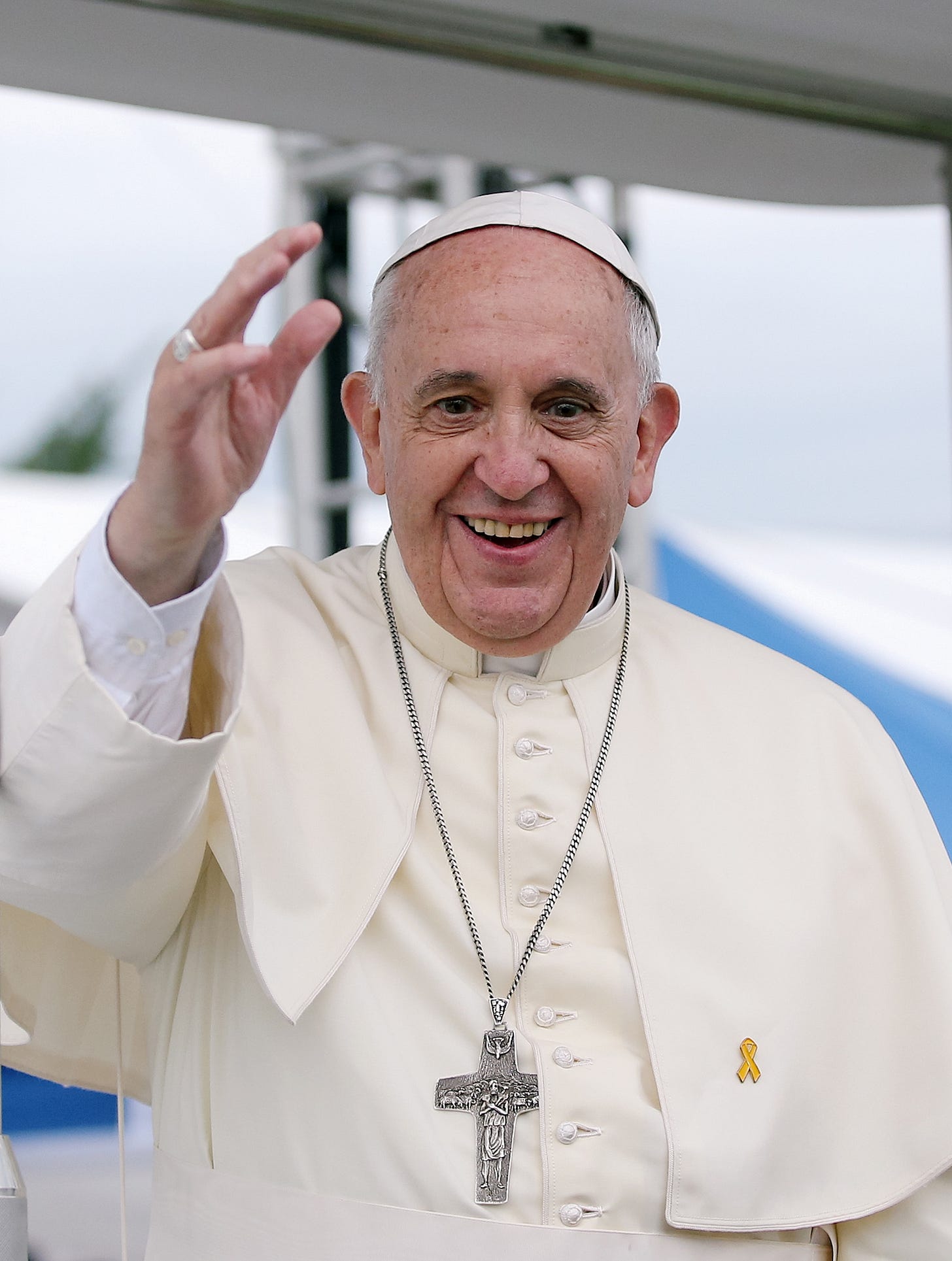 Pope Francis waves and smiles Pope Francis waves and smiles