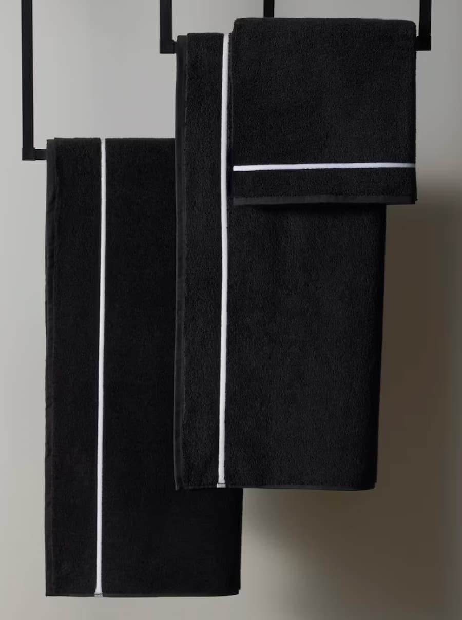 black bath towels with white stitch detail