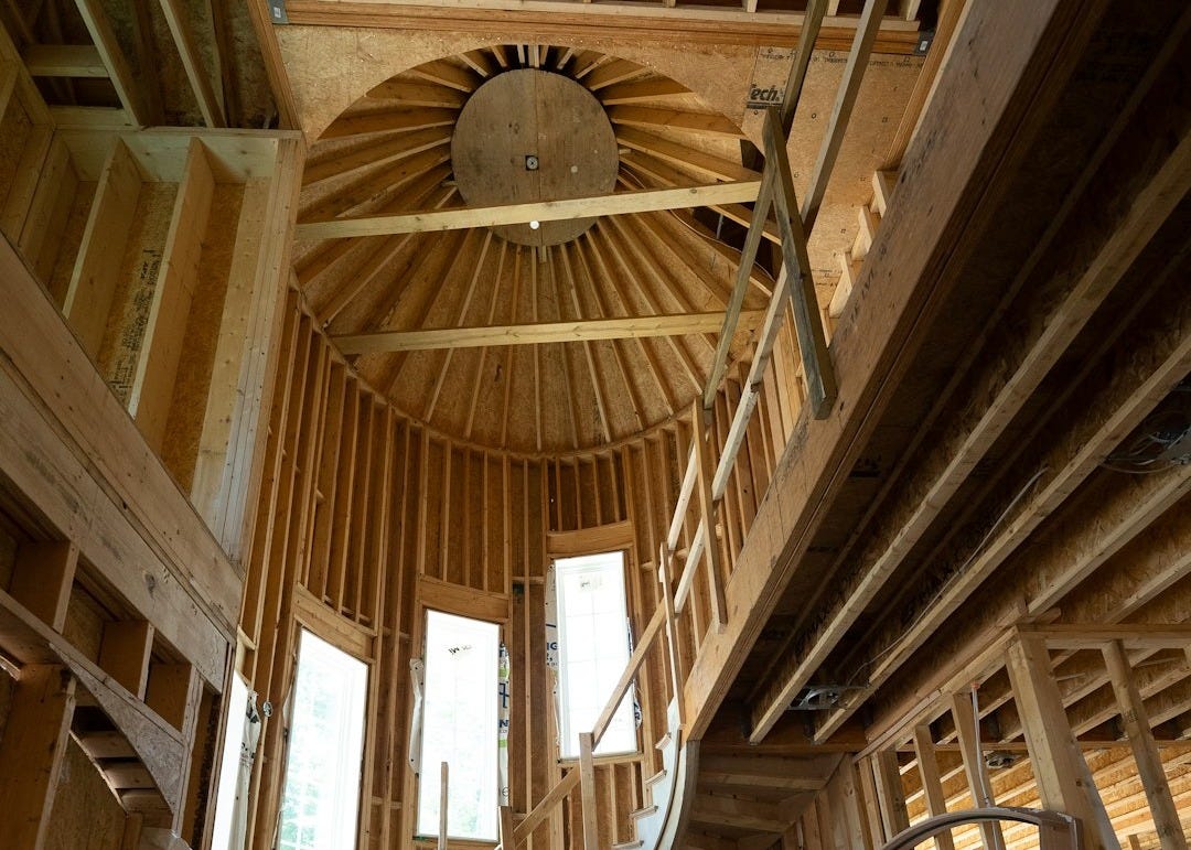 a wooden staircase in a wooden building