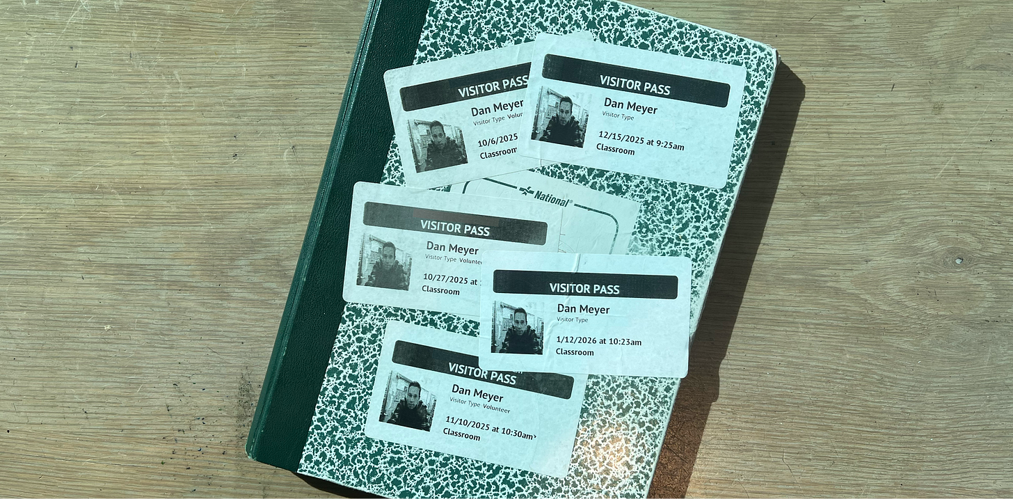 A notebook that has school visitor passes spackled all over it. A notebook that has school visitor passes spackled all over it.