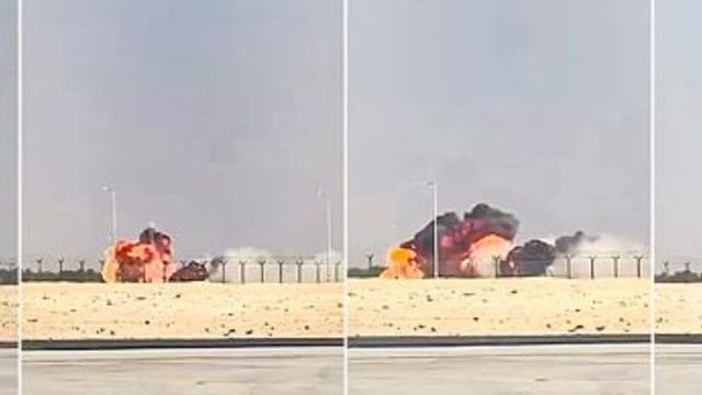 In this combo of screenshots from a third party video, a fighter jet Tejas of the Indian Air Force is seen dropping altitude and then crashing on the ground, engulfed in a ball of fire, during an aerial display at the Dubai Air Show.