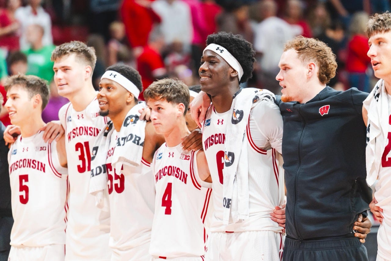 wisconsin basketball players from left to right Jack Janicki, Nolan Winter, Eian Elmer, Zach Kinziger, Victory Onuetu, Austin Rapp, Will Garlock wisconsin basketball players from left to right Jack Janicki, Nolan Winter, Eian Elmer, Zach Kinziger, Victory Onuetu, Austin Rapp, Will Garlock