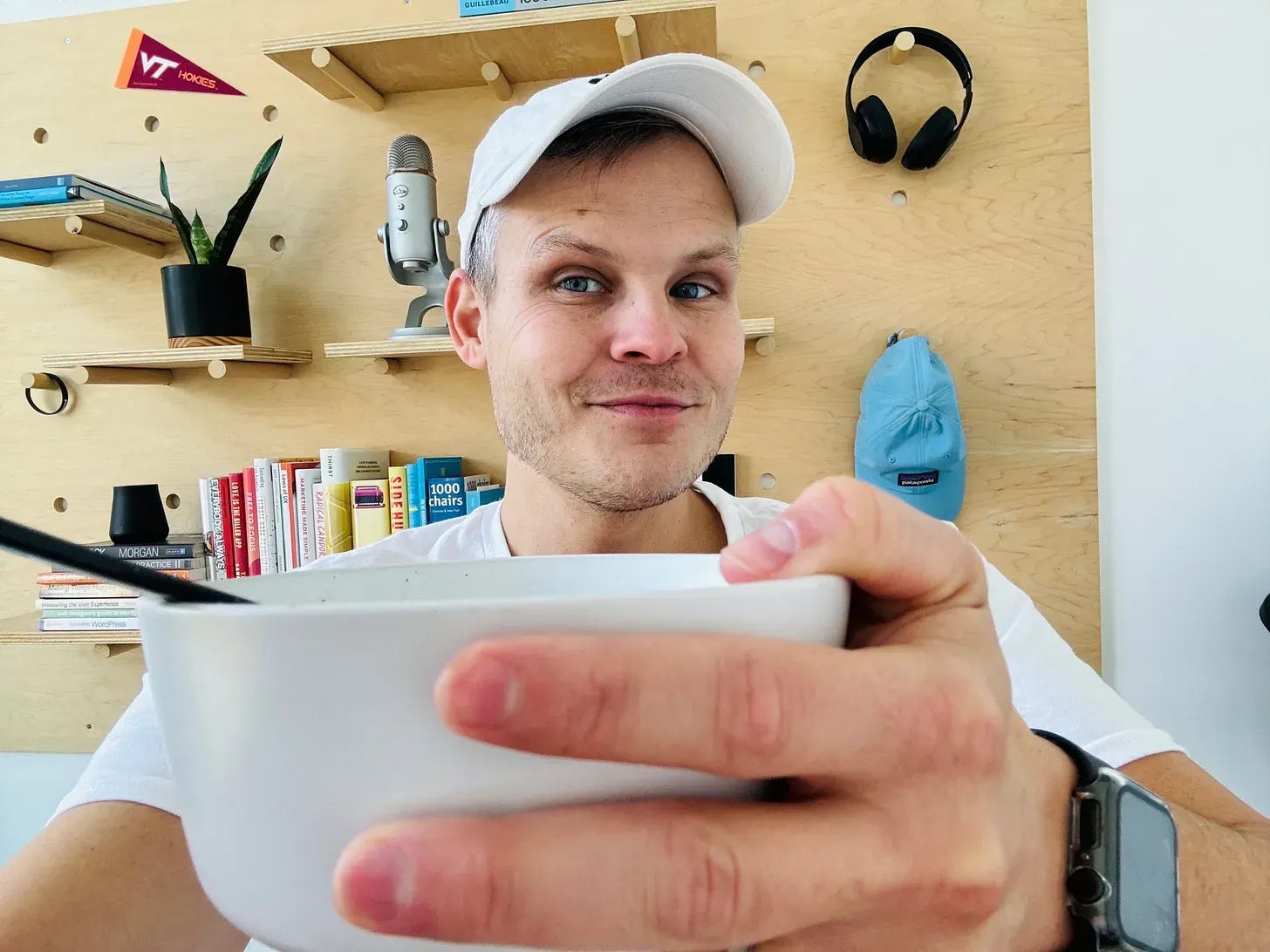 Jeremy holding a bowl of cereal.