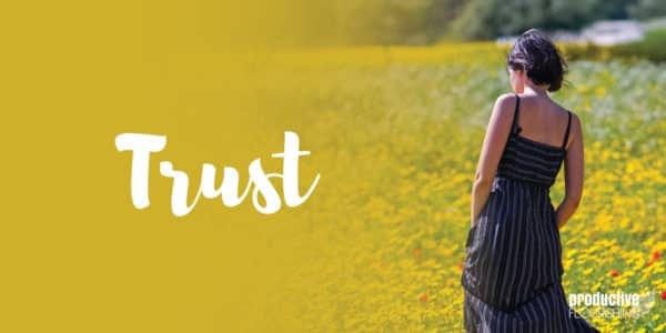 Woman walking in a field of flowers. Text overlay: Trust Woman walking in a field of flowers. Text overlay: Trust
