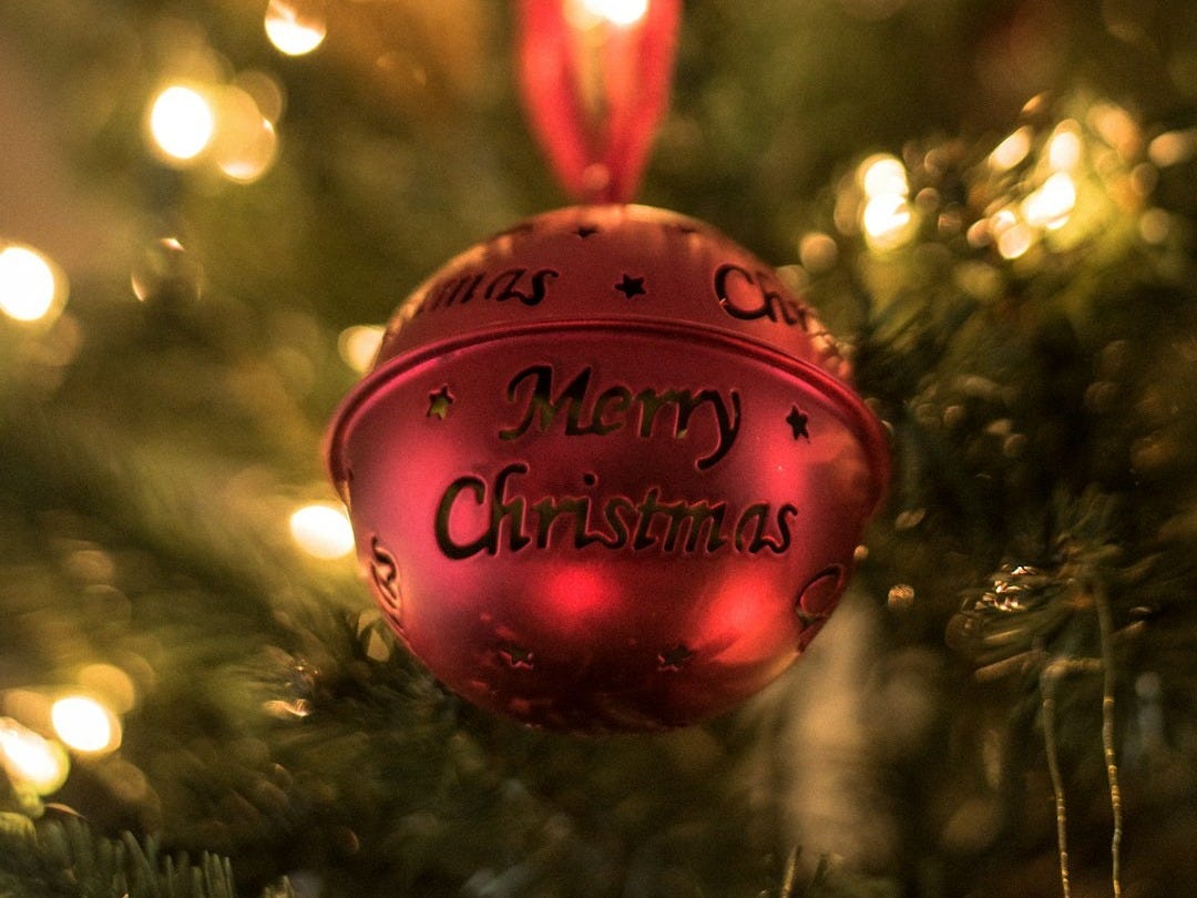 red Christmas bell on Christmas tree red Christmas bell on Christmas tree