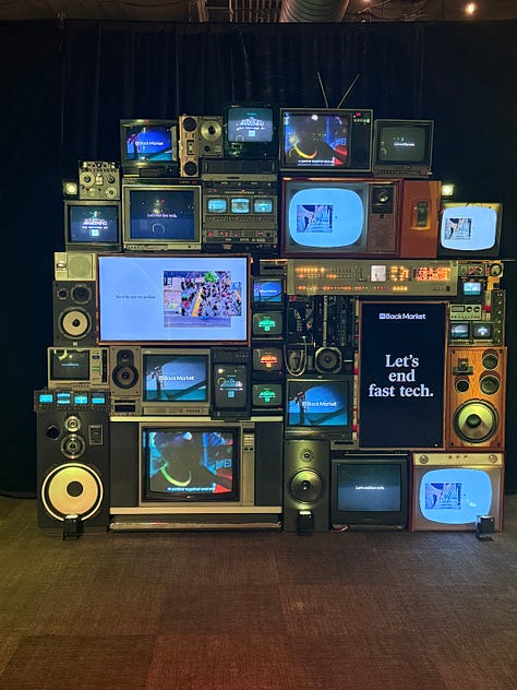 Three images, two of which show large signs in lights reading The Slow Tech Awakening and End Fast Tech. The third image is a real-life collage of old technology as an art display.