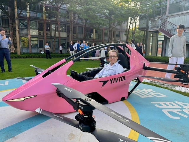 Seated inside the YIVTOL S-Zero, Qianhai. May 2026.