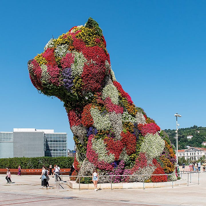 LEFT: A Friend in Need (1903) by Cassius Marcellus Coolidge, a classic example of kitsch. RIGHT: Puppy (2010) by Jeff Koons, who has explored the concept in a self-aware way.