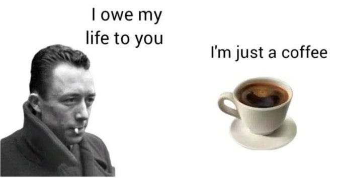 Black-and-white portrait of Friedrich Nietzsche wearing a coat and looking pensively with a cigarette in his mouth on the left side and a white ceramic cup holding dark coffee liquid on a plain surface on the right side with overlaid white text reading I owe my life to you above the portrait and Im just a coffee below the cup.