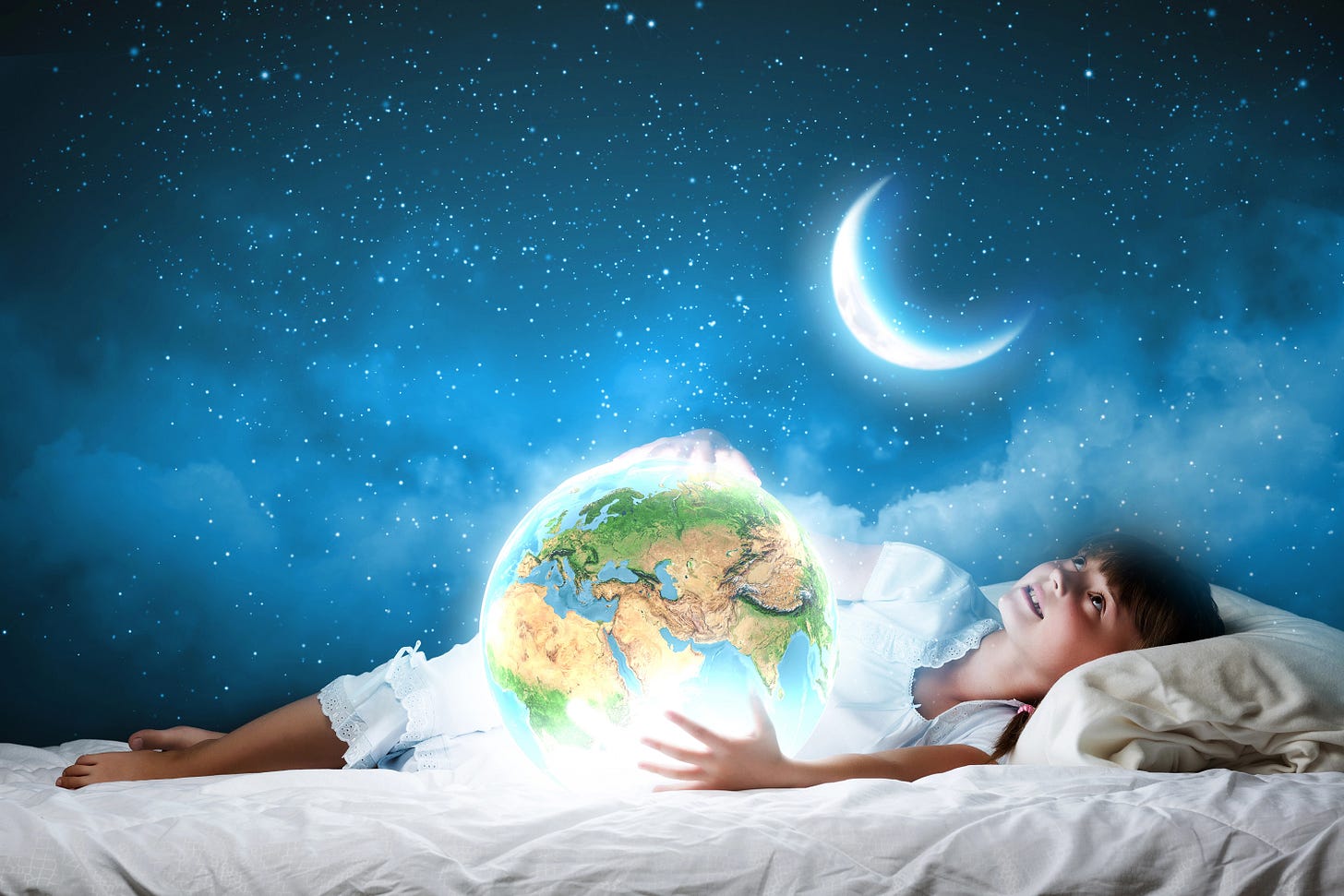 A child holding the world looking up at the stars smiling