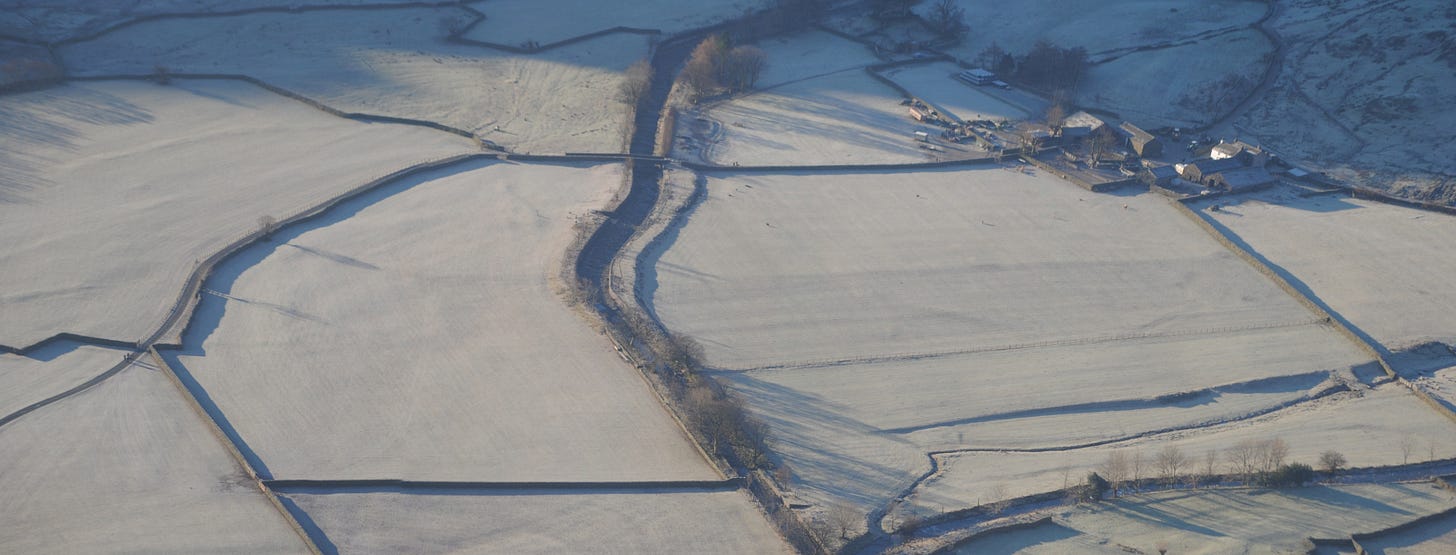 frost-covered fields seen from above