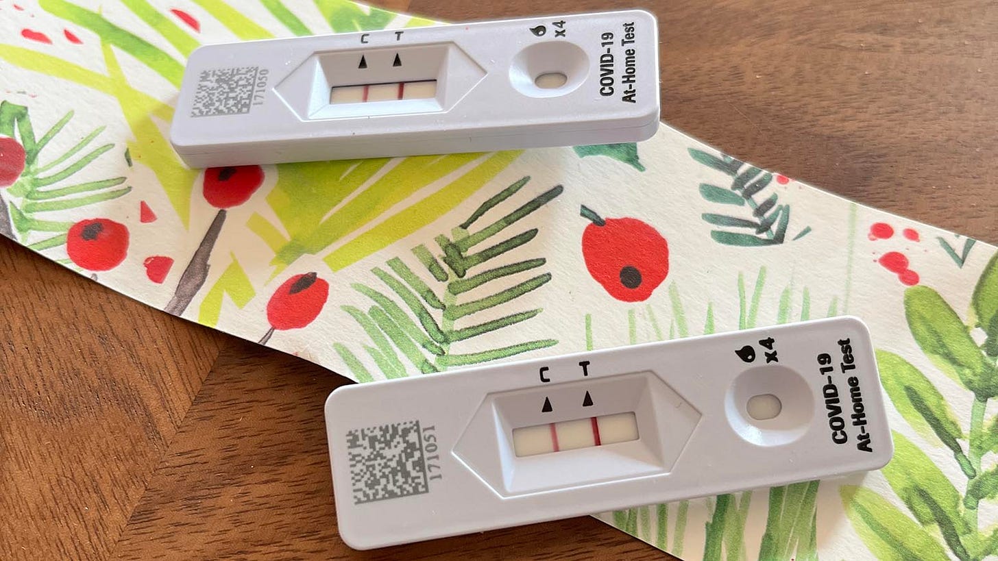 Positive covid tests on xmas wrapping paper