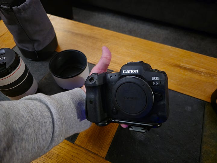 View of the R5 from the front, and from the back with display flipped open.