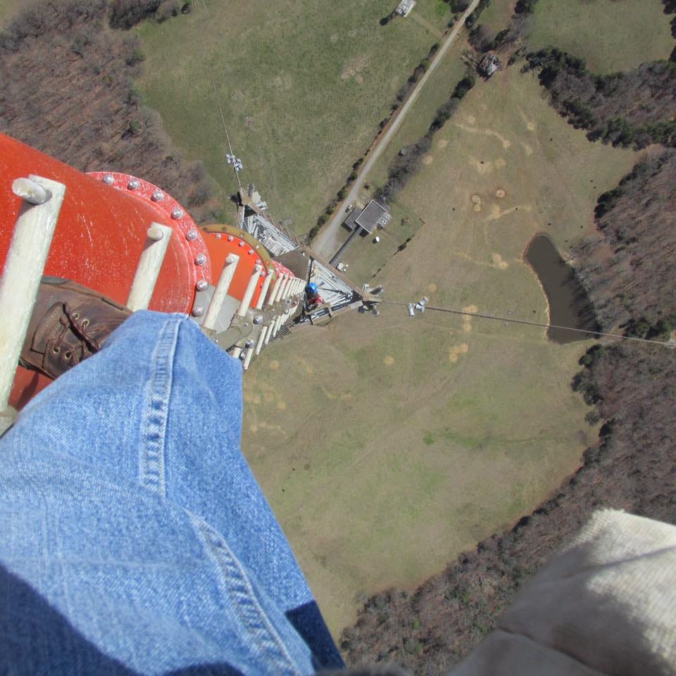 looking down from the antenna of a TV tower looking down from the antenna of a TV tower