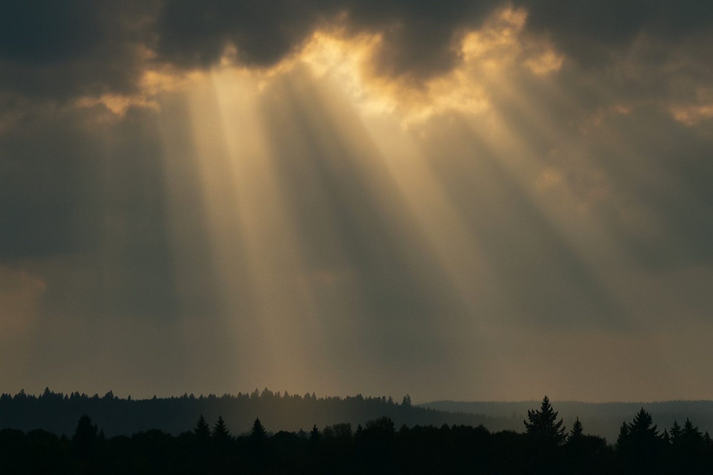 rays of light emerging from clouds