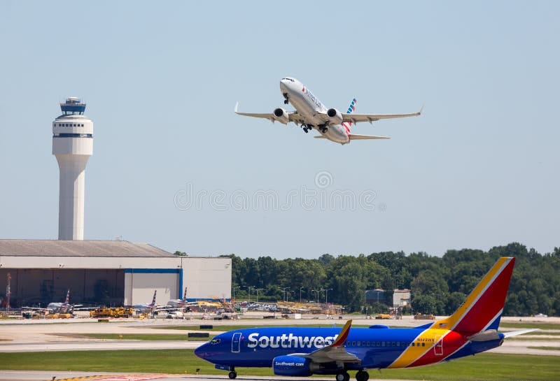 Busy Runway at Charlotte-Douglas International Airport Editorial Stock Image - Image of cloudless, busy: 150737859 Busy Runway at Charlotte-Douglas International Airport Editorial Stock Image - Image of cloudless, busy: 150737859