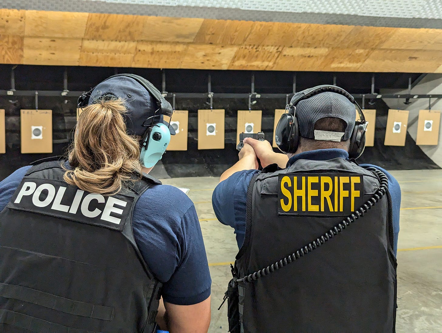 An officer recruit fires a pistol during firearms training at the George S. Mickelson Law Enforcement Center in Pierre on July 8, 2024. (John Hult/South Dakota Searchlight) An officer recruit fires a pistol during firearms training at the George S. Mickelson Law Enforcement Center in Pierre on July 8, 2024. (John Hult/South Dakota Searchlight)
