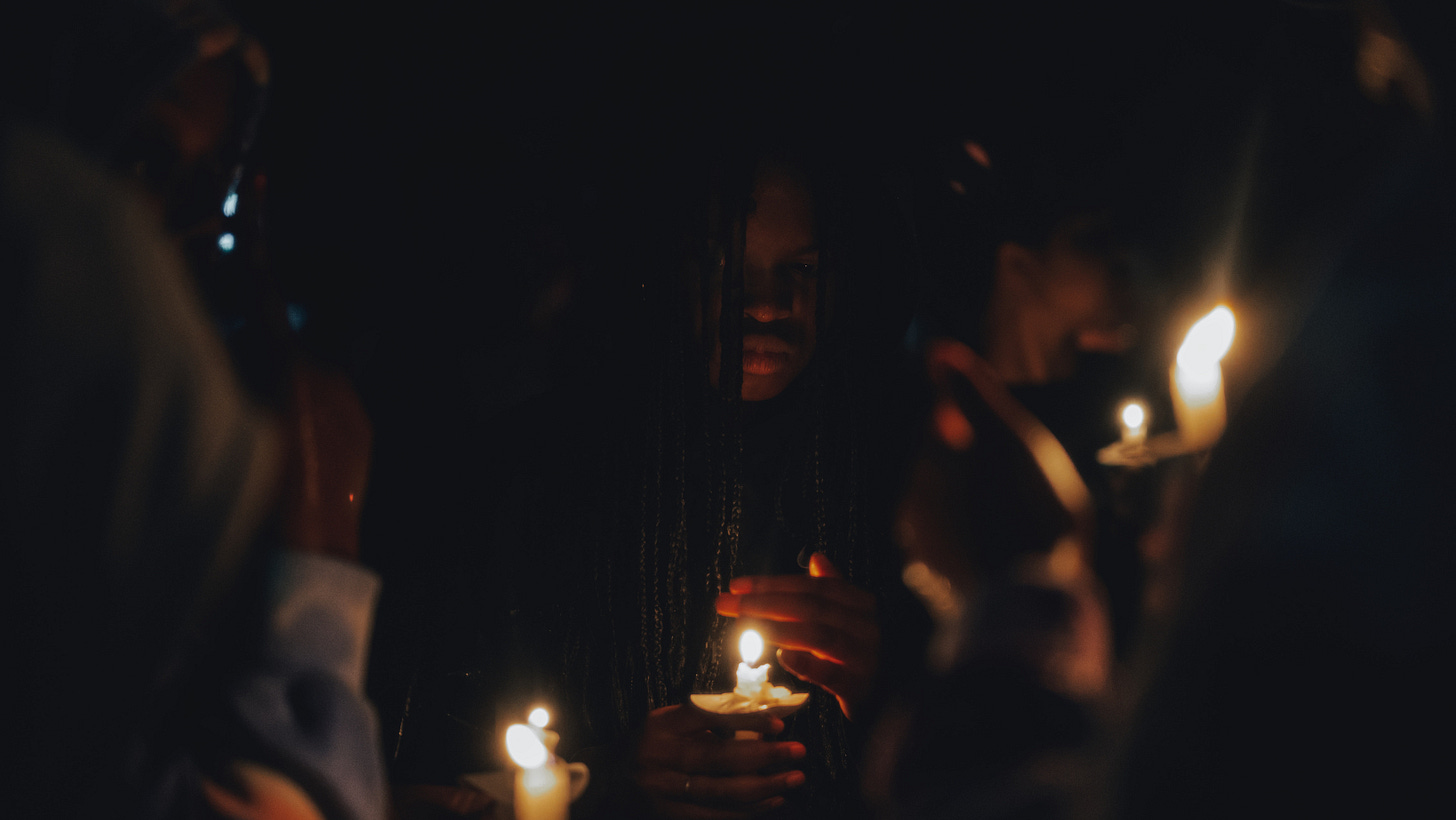 Child holding candle Child holding candle
