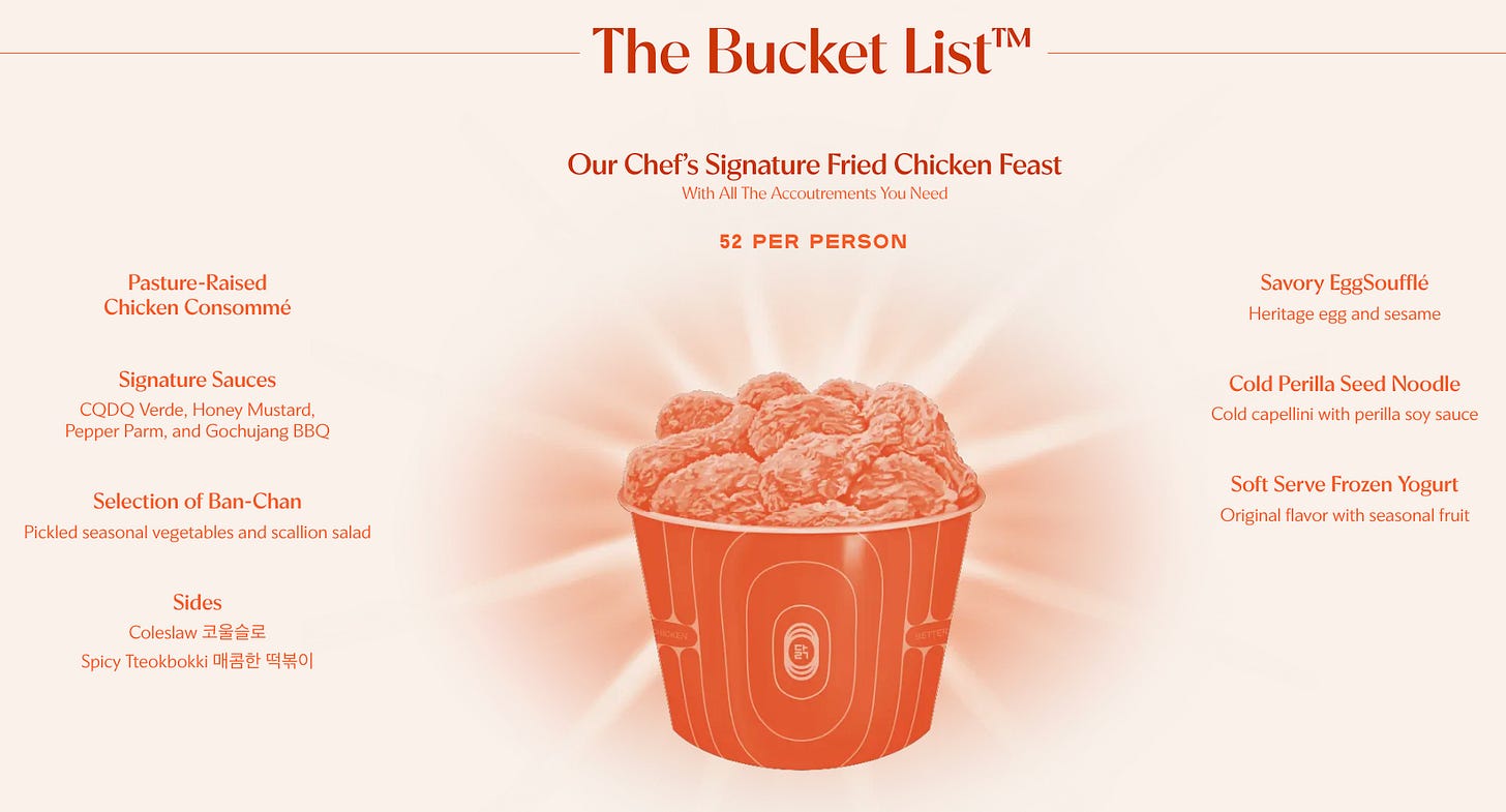 A menu showing a picture of a bucket of Korean fried chicken, and listing all of the small dishes and a dessert that come with the prix fixe A menu showing a picture of a bucket of Korean fried chicken, and listing all of the small dishes and a dessert that come with the prix fixe