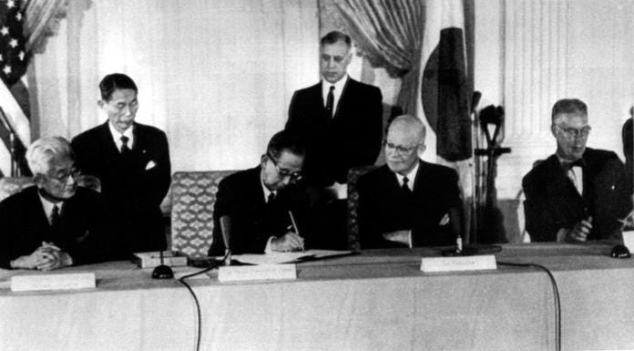 Japanese and US officials sign treaty (© Robert M. Baer/AP Images) Japanese and US officials sign treaty (© Robert M. Baer/AP Images)