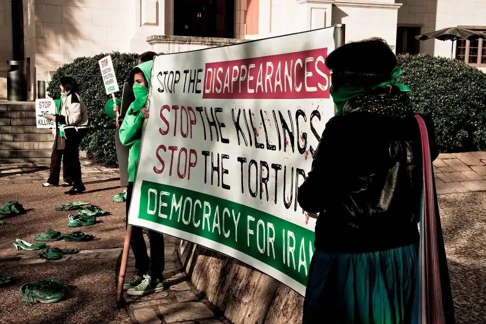 Student protests against Iranian regime intensified in 2026. The rise in student protests reignited threats from U.S. President Donald Trump towards Iran where he vowed to prevent Iran from attaining nuclear power. (image sourced from Socialist Worker, originally uploaded to Flickr by Christopher Rose under CC by-NC-SA 3.0, https://socialistworker.co.uk/international/students-in-iran-reignite-anti-regime-protests/)
Student protests against Iranian regime intensified in 2026. The rise in student protests reignited threats from U.S. President Donald Trump towards Iran where he vowed to prevent Iran from attaining nuclear power. (image sourced from Socialist Worker, originally uploaded to Flickr by Christopher Rose under CC by-NC-SA 3.0, https://socialistworker.co.uk/international/students-in-iran-reignite-anti-regime-protests/)