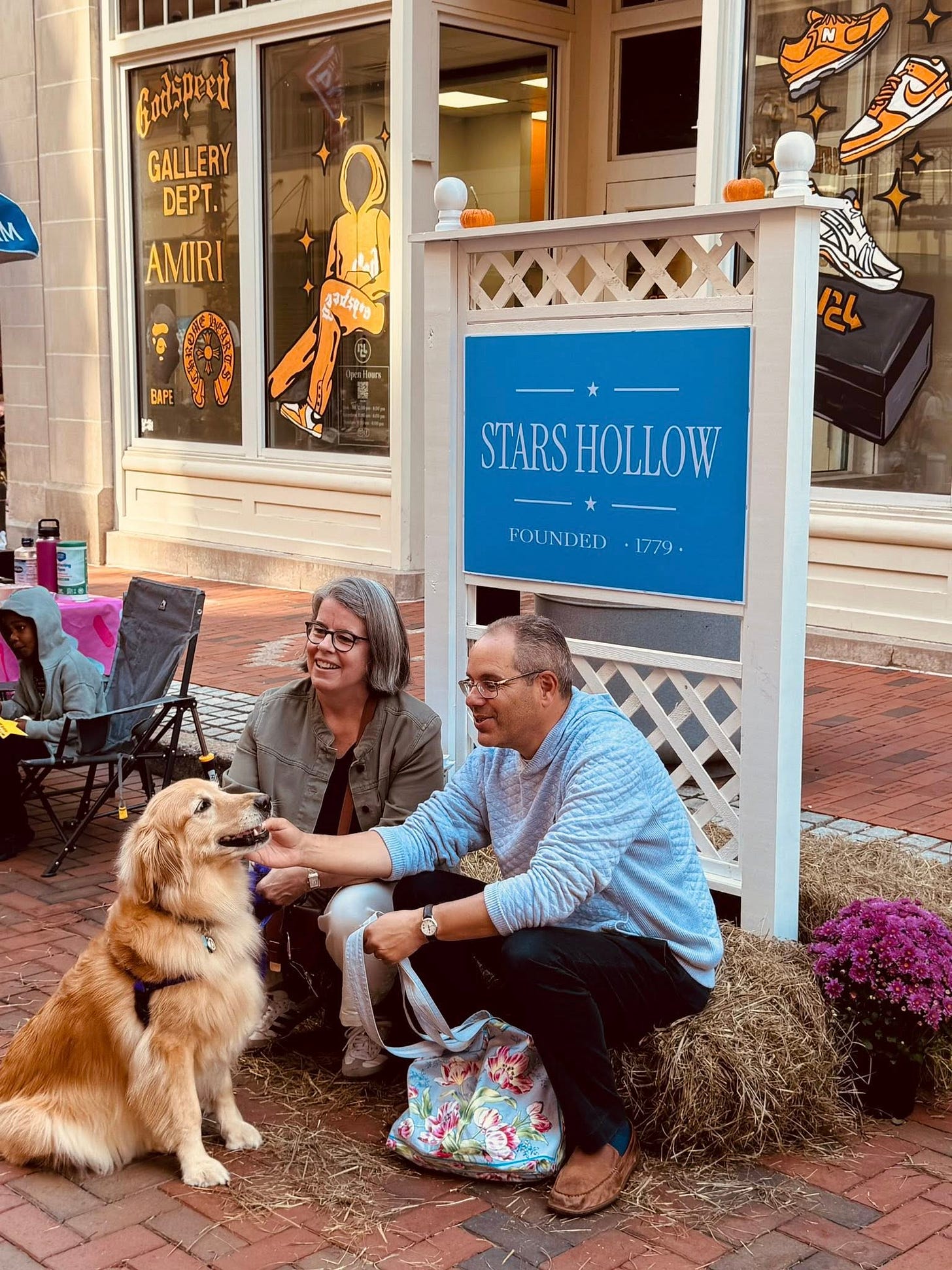 May be an image of 2 people and text that says 'futipect GALLERY DEPT. AMIRI 6APE STARS SHOLLOW FOUNDED FOUNDED.1779 1779'