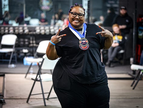 Collage of pics of Kanoelani Patterson at her 1st powerlifting meet. She has Brown Skin & Purple Braids & is wearing glasses. She is wearing a black shirt & Black singlet. Her nails are orange. She is showing squatting & deadlifting. The plates are red.