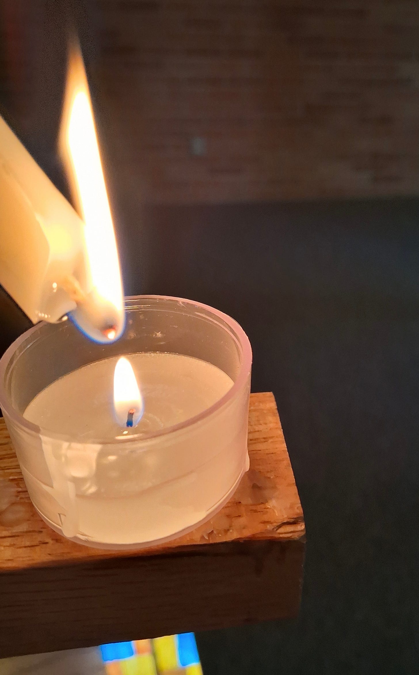 One candle lighting another one