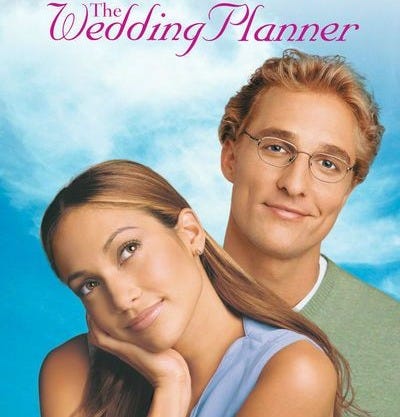 This may contain: the wedding planner movie poster with a man and woman in front of blue sky background