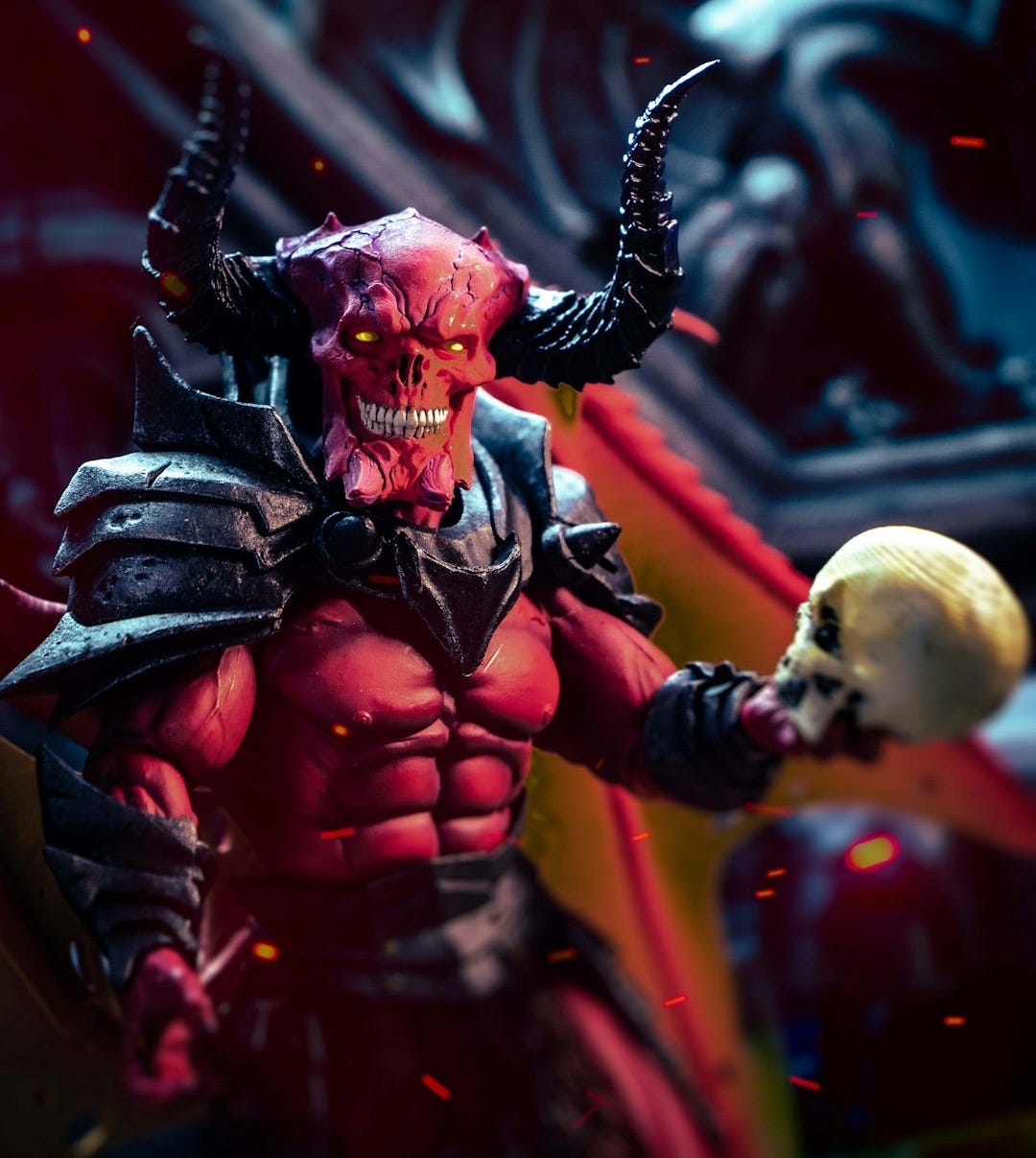 a demonic demon holding a skull in his hand a demonic demon holding a skull in his hand