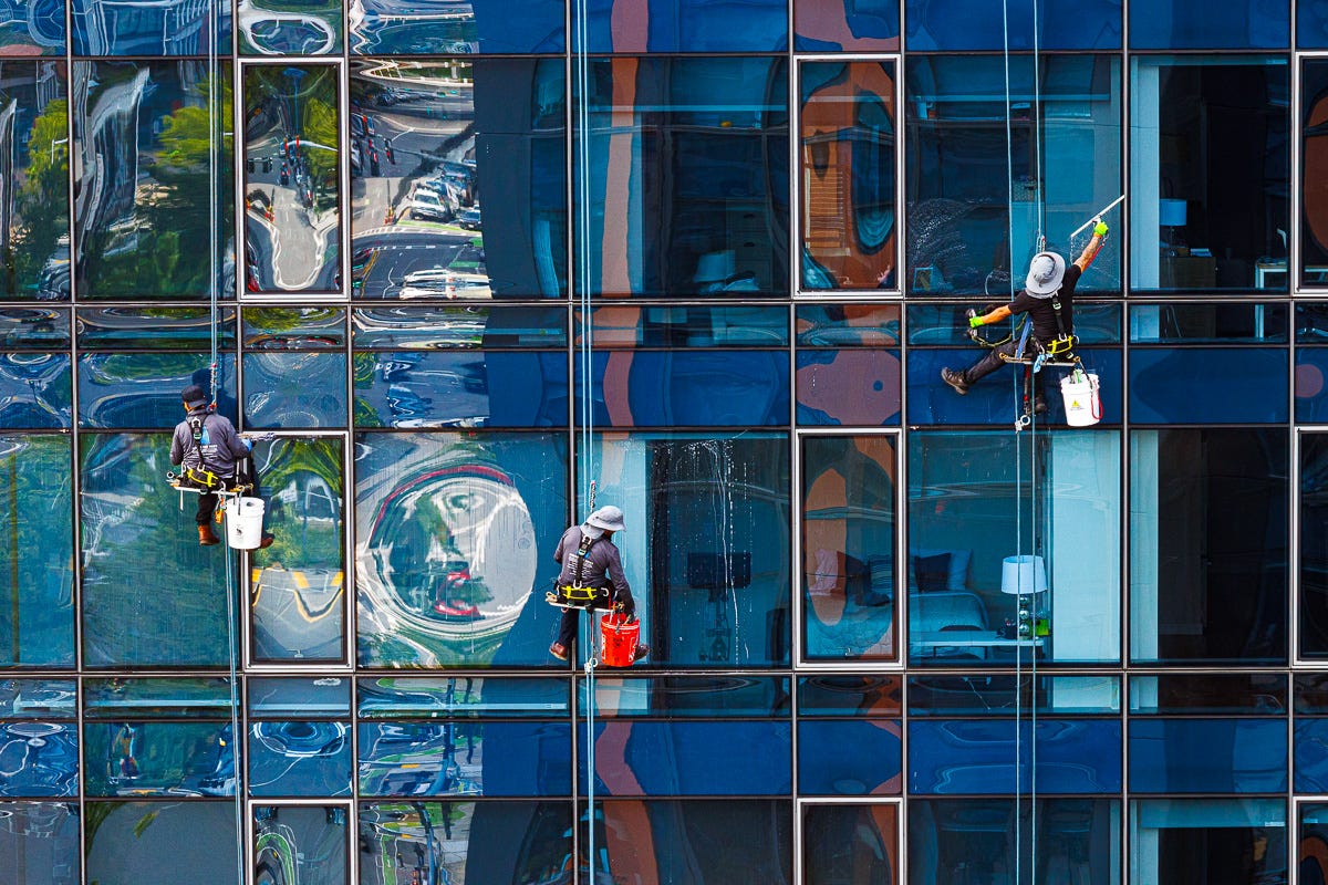 Another perspective of high-rise exterior captured from balcony.