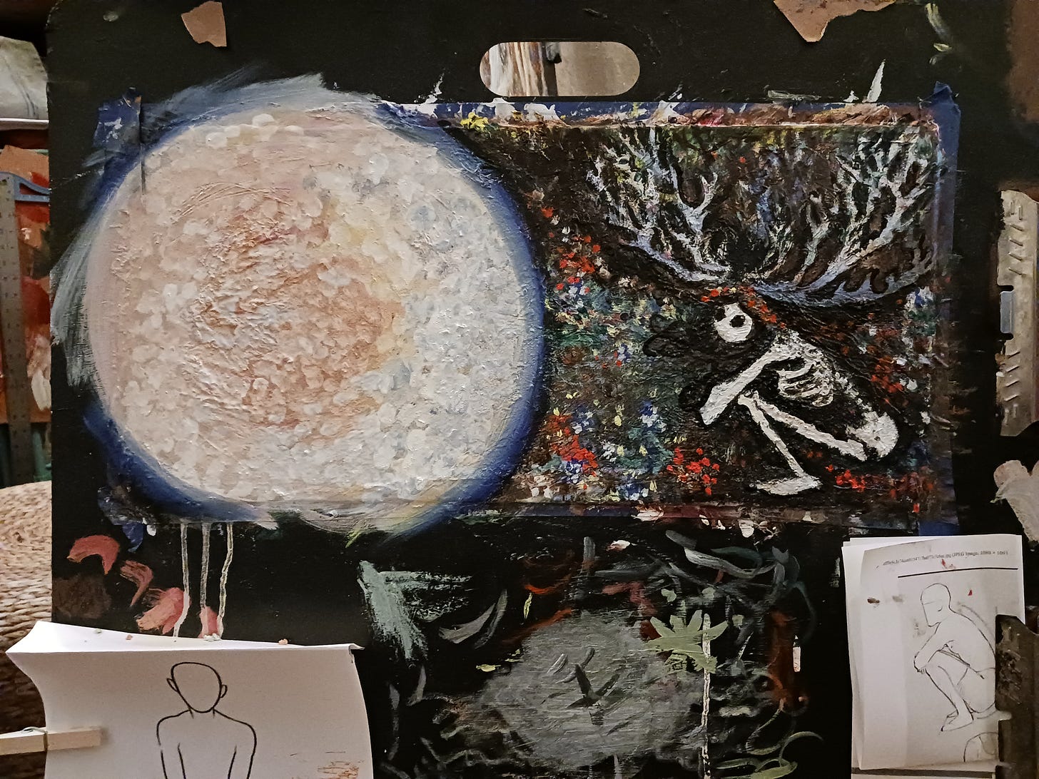 photo of my easel with a painting and reference materials attached to it. The painting is of a feufollet or I guess Cajun swamp gas fairy, curiously examining a giant, glowing ball. She is surrounded by flowers. The fairy is a small skeleton with long, swirly black hair, a flower crown, and antlers. photo of my easel with a painting and reference materials attached to it. The painting is of a feufollet or I guess Cajun swamp gas fairy, curiously examining a giant, glowing ball. She is surrounded by flowers. The fairy is a small skeleton with long, swirly black hair, a flower crown, and antlers.