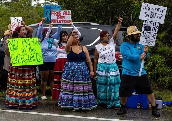 Aimee Osceola, center, and hundreds of other people protested against the development of an immigration detention center, dubbed "Alligator Alcatraz," in Big Cypress National Preserve, on June 22, 2025. Aimee Osceola, center, and hundreds of other people protested against the development of an immigration detention center, dubbed "Alligator Alcatraz," in Big Cypress National Preserve, on June 22, 2025.