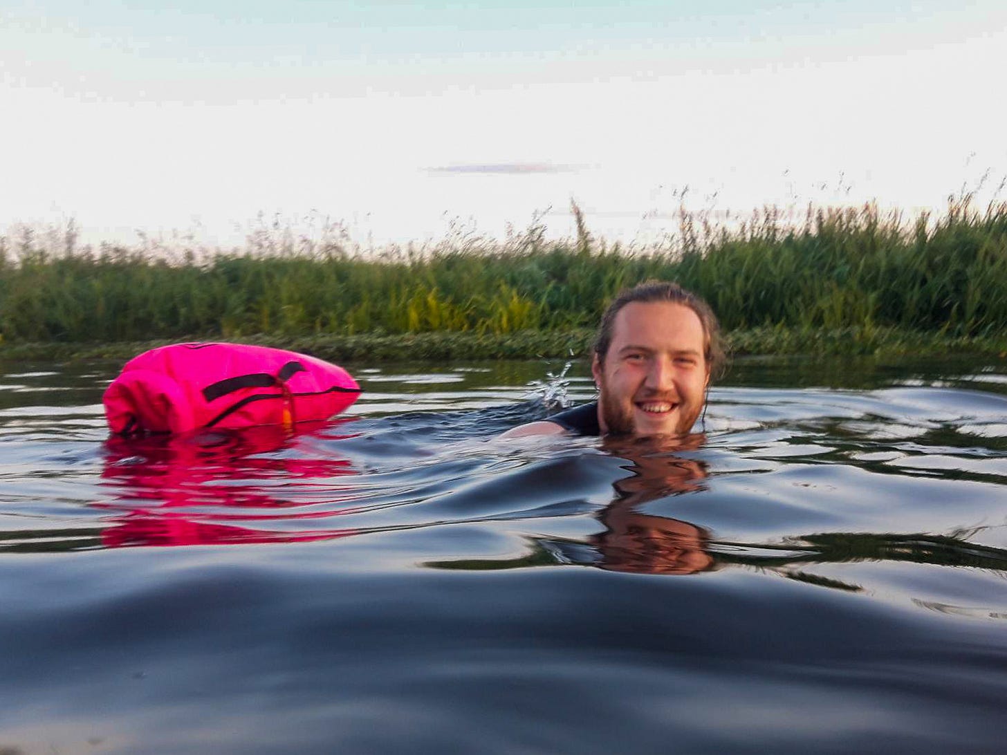 Myself, swimming in the river. Photo taken from the water by another swimmer.
