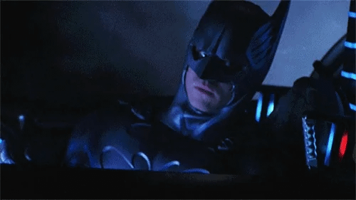 Batman gives a thumbs up. Batman gives a thumbs up.