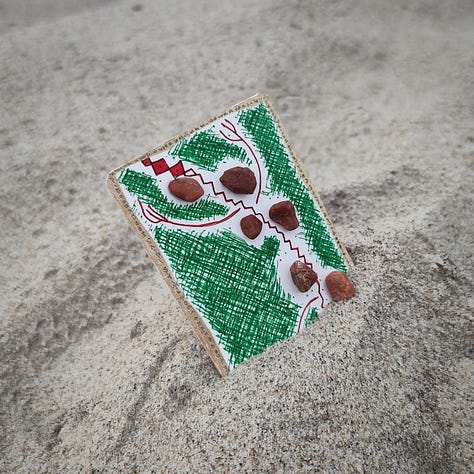 Cards, stones, flower, pens – available for purchase)
